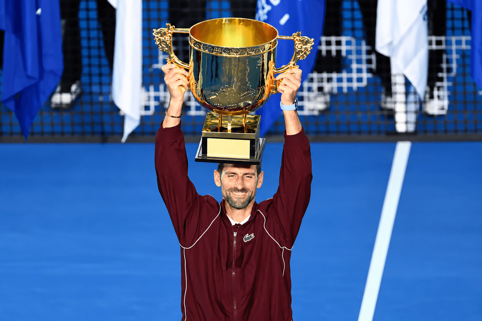 Djokovic conquista Pequim pela sétima vez após lesão obrigar De Minaur a abandonar a final
